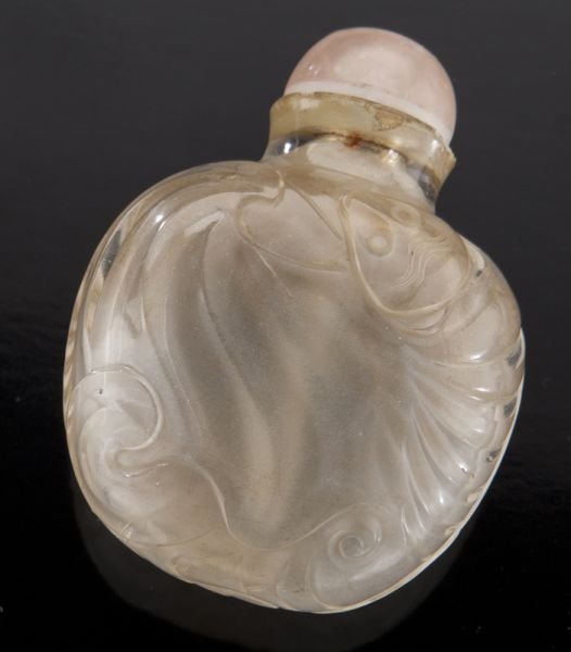 Chinese Qing carved rock crystal snuff bottle: Chinese Qing carved rock crystal snuff bottle depicting double bats. 2.5"H, Circa - 18th - 19th C.