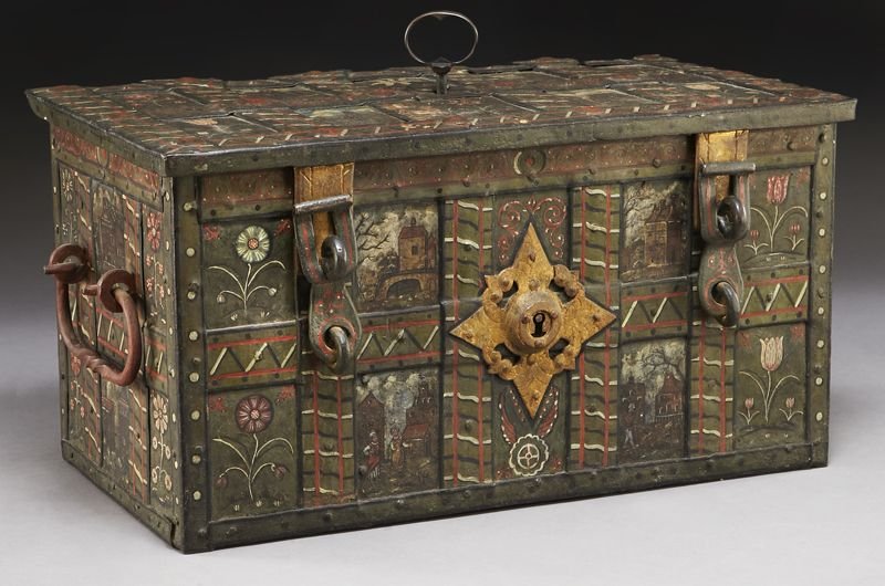 German polychrome and iron armada chest: German polychrome and iron armada chest with later painted decoration depicting flowers and village scenes, the hinged lid concealing an intricate system of locks beneath a pierced lockplate, the fron