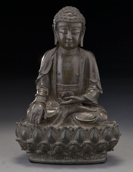 Chinese Ming bronze Buddha: Chinese Ming bronze Buddha seated on a lotus throne, hands in Buddhist mudra. 10.75"H, Circa - 16th - 17th C.