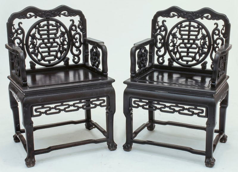 Chinese Wood Armchairs: Finely carved depicting five bats and character of longevity on back panel, with pattern on two arm panels. H 38 x W 24 x D 18.5
