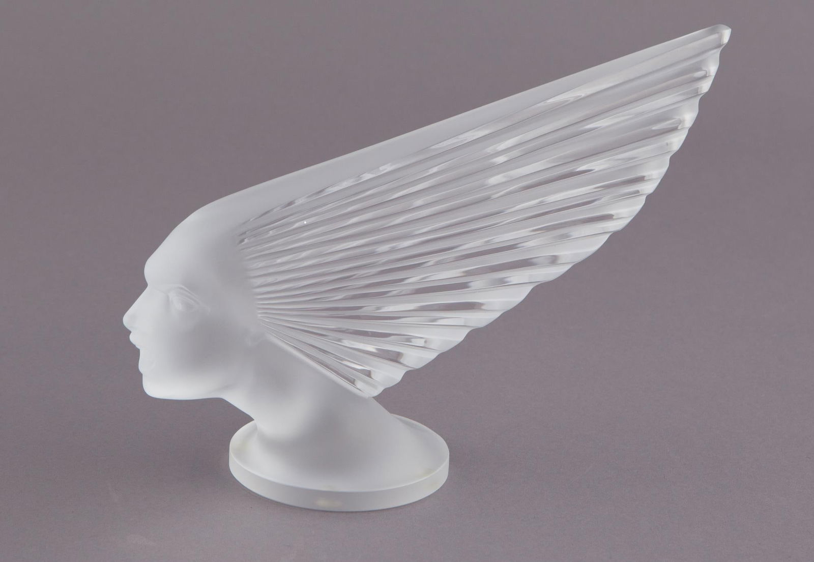Lalique Victoire Car Mascot in Crystal: Lalique Victoire Sculpture was released to celebrate the centenary of the armistice of World War 1. Etched at the base, this sculpture comes with original box. H 6 3/4 x W 10 in