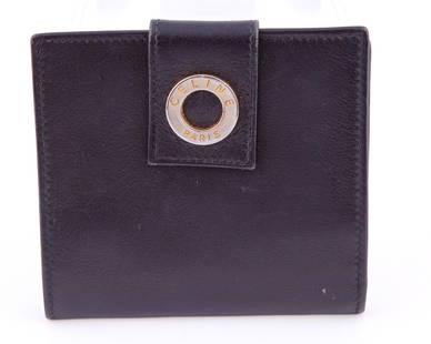 Celine Bifold Ladies Wallet: Black with tan interior. Coin holder with two slots for credit cards and bill compartment. H 3.25 W 4