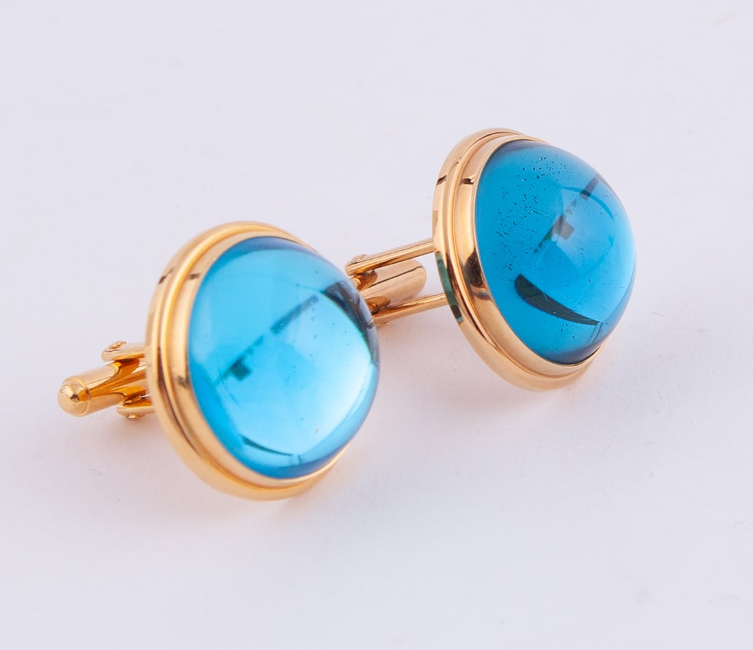 Lalique Cufflinks: Blue glass set in gold hardware. Signed Lalique France. Original suede bag.