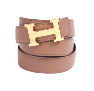 Hermes Belt: Brown leather belt with gold tone buckle. 100T L 44 in