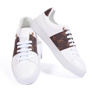 Louis Vuitton Sneakers: Louis Vuitton sneakers, size 40. White, with monogram details. New, still in the original box.