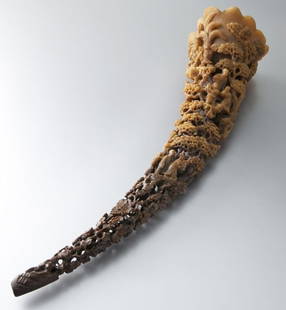 Large 19th C. Rhinoceros horn carving,: Large 19th C. Rhinoceros horn carving, (International Shipping IS NOT available on this lot) carved as a deep lotus leaf cup, the long stem tapering to the point of the horn, the color graduating