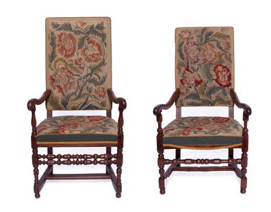 Pair of 18th Century Bonne Femme Arm Chairs: Wooden arms and carved legs, upholstered backs and seats with floral needlepoint details. Measuring H 46.5 W 24.5 D 20 in Provenance: imported by private Dallas collector from Languedoc, France