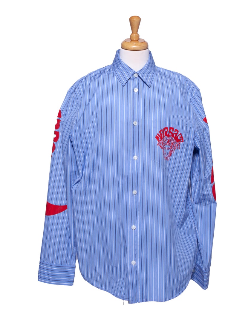 Versace Medusa Music Stripes Shirt: Men's azure and white striped shirt with buttons. Versace logo and writing on sleeves and pocket. Size M Perfect condition.