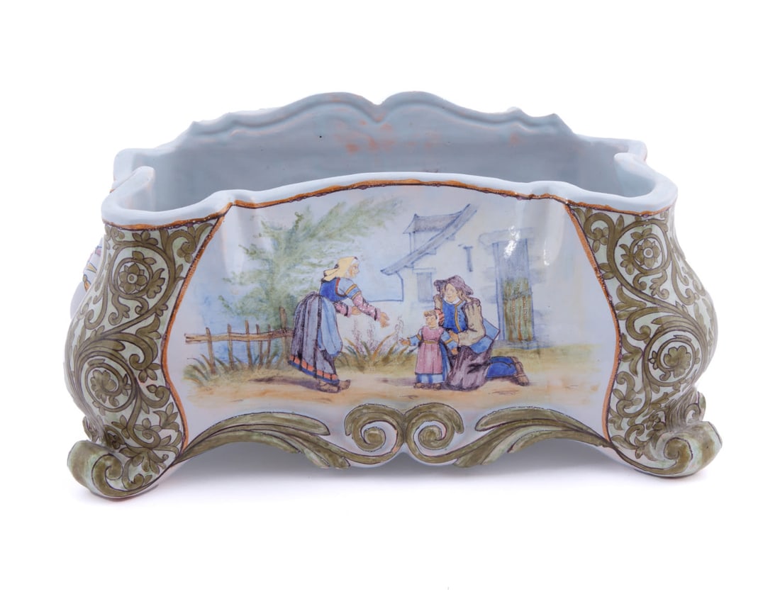 Quimper Jardiniere, Porquier-Beau: Scrolling top and bottom with scene of child and parents. Signed on underside ROSPORDEN PB Measuring H 6.5 W 13 in In good condition, some chips to edges. Provenance: Floyd and Beverly Sherman's Priva