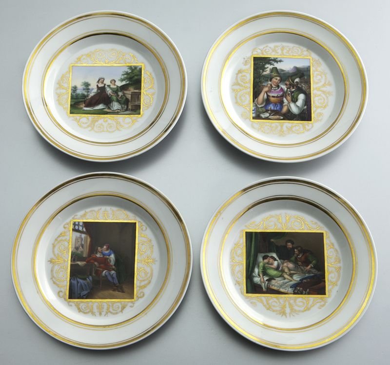 (4) KPM porcelain plates centered by panels: (4) KPM porcelain plates centered by panels depicting figural scenes, accented by gilt painted scrolls, with gilt rims. Titled on base. Each marked "KPM" with scepter in blue under glaze. 7'' Dia., Ci