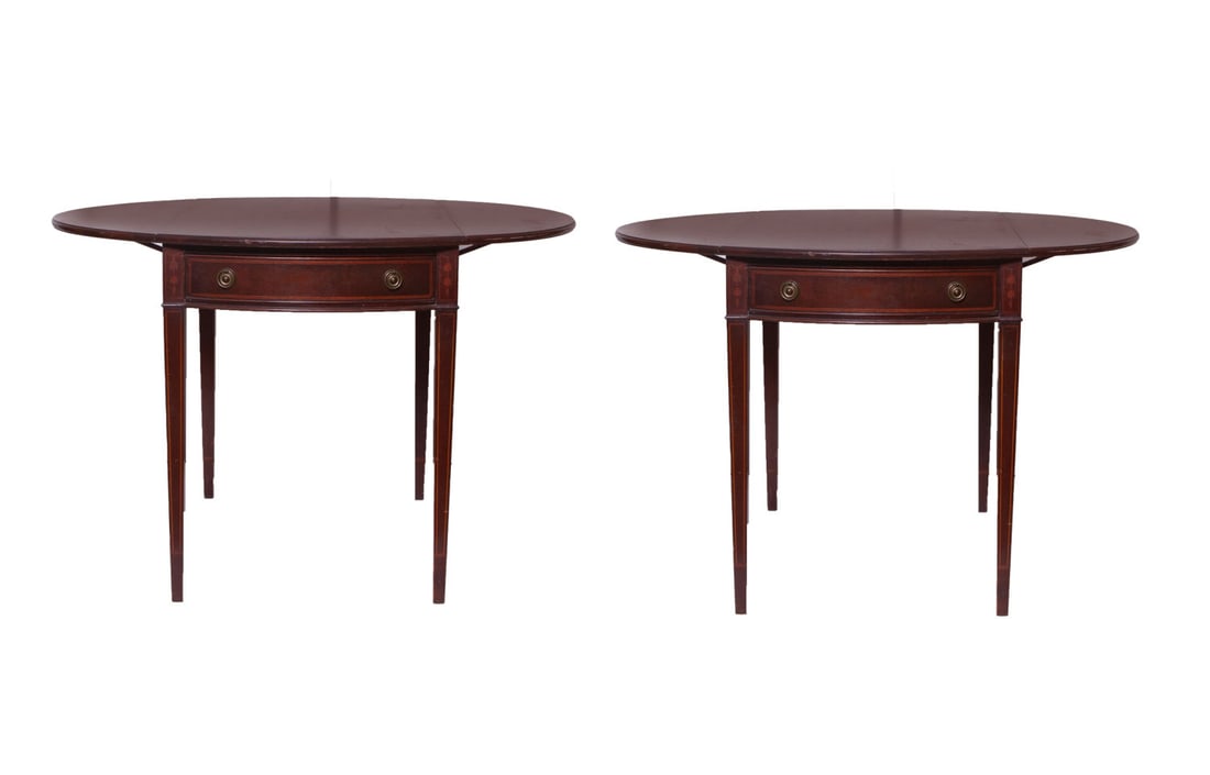 Pair of Brandt Drop Leaves Tables: Two drop leaves tables marked Brandt, Maryland on the inside, each with one drawer and two brass knobs. Finely decorated with light-wood inlay details around the perimeter. The two leaves can be folde