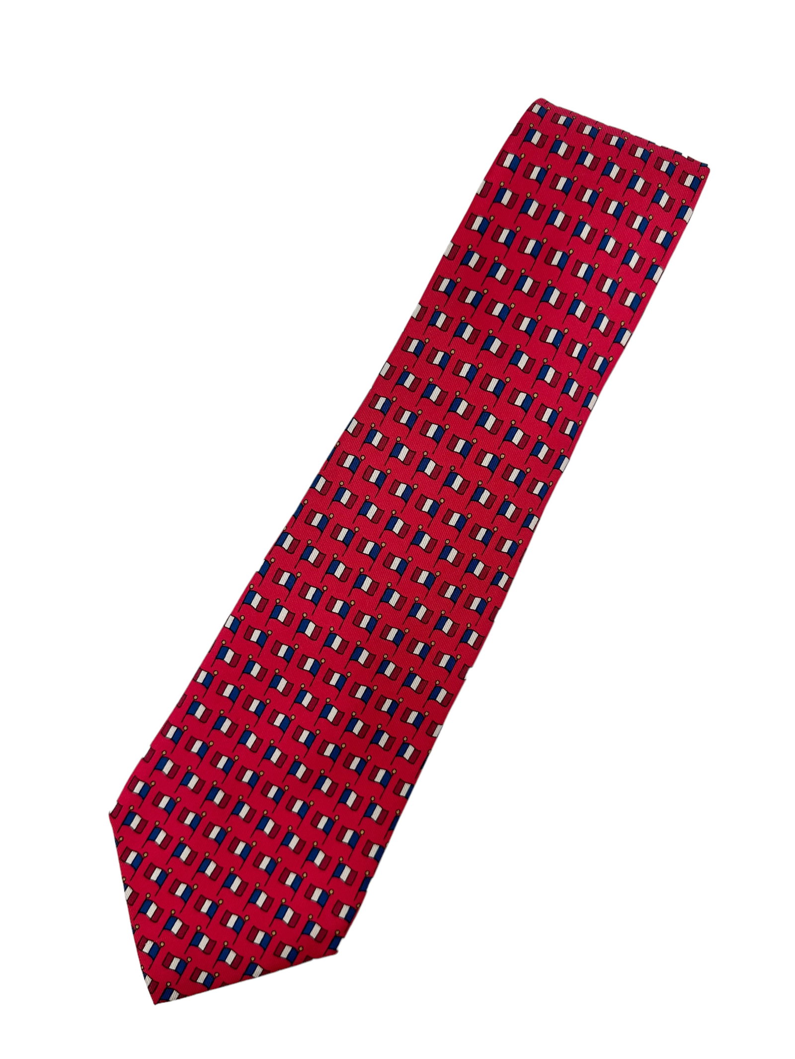 GENTLEMANS HERMES TIE: 100% silk tie In red with red, white and blue flags. 7142 FA In great condition. Provenance: Private Chicago Collector No reserve
