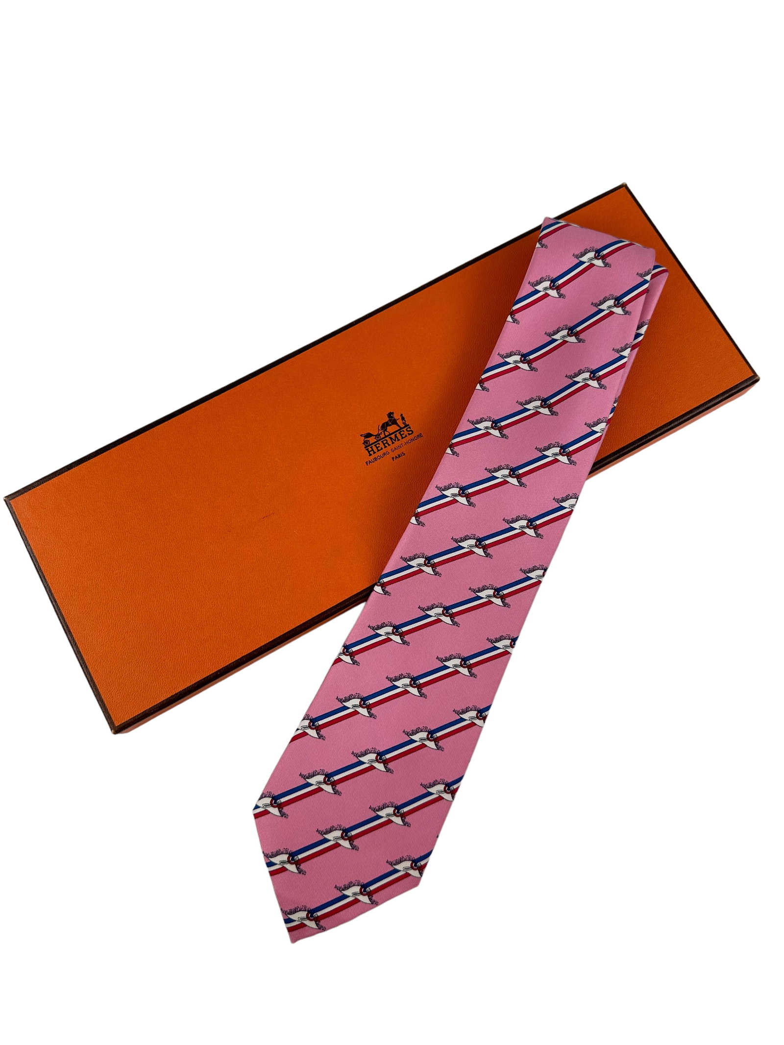 GENTLEMANS HERMES TIE: 100% silk tie pink with red, white and blue stripes 7164 FA Comes with box and papers In great condition. Box measuring H 1 W 15 D 5 in Provenance: Private Chicago Collector No reserve