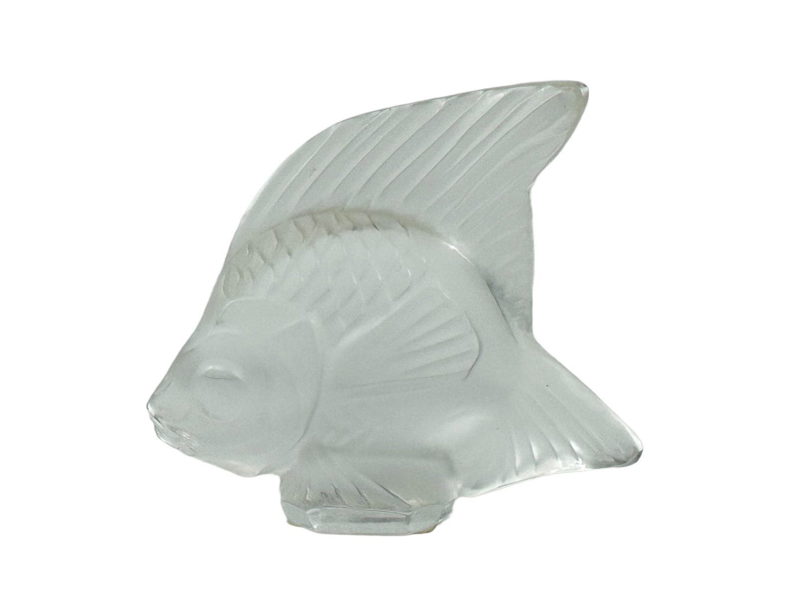 LALIQUE GLASS FISH FIGURINE: In glass, with original dust bag and packaging. Marked Lalique France on base. Figurine measuring H 1.75 W 8 in Box measuring H 1.75 W 4 D 2.5 in In pristine condition. Provenance: Private Chicago Col