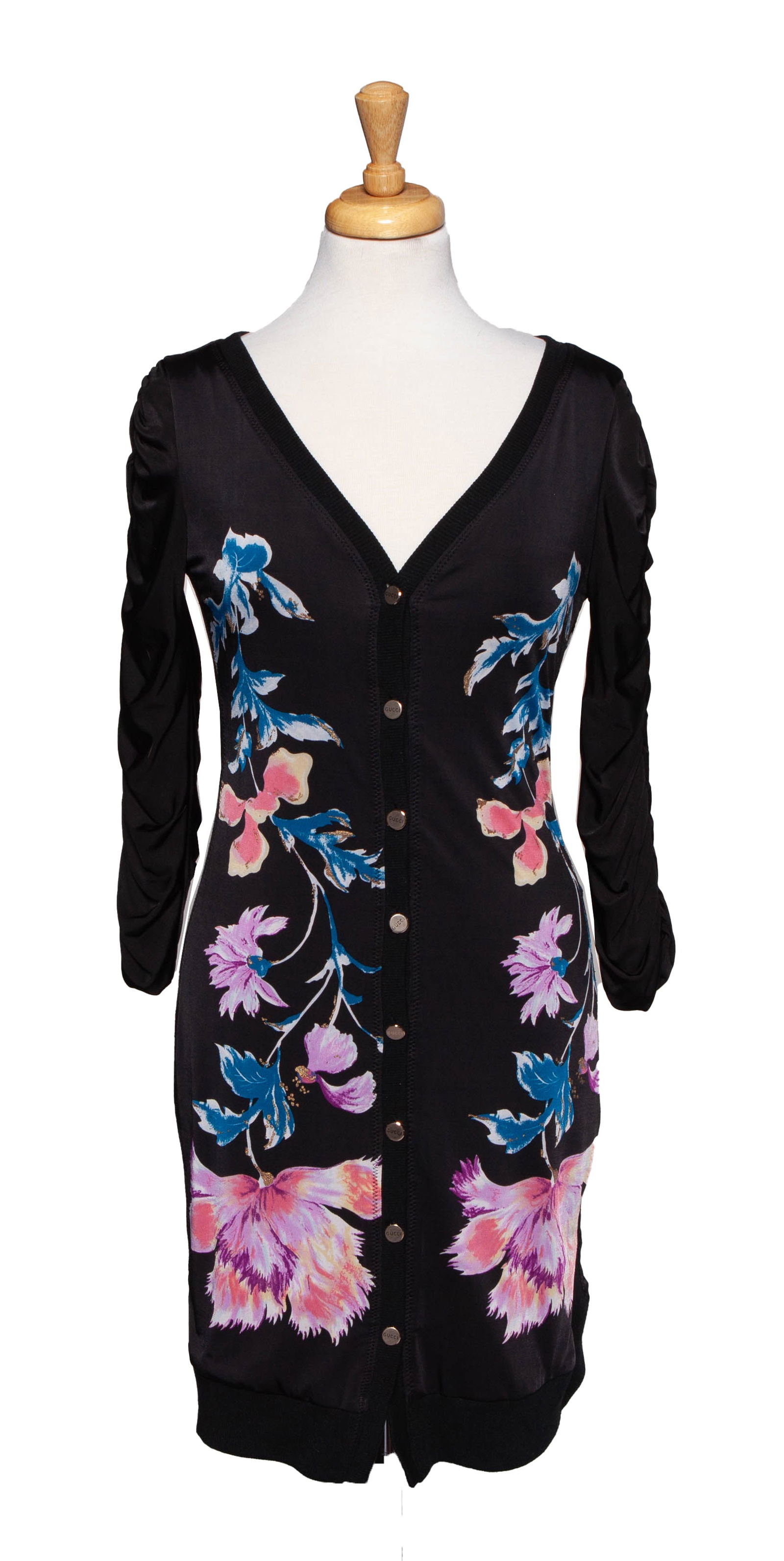 Gucci Black Button Down Floral Dress: Gucci mid-length black midi dress with pink and blue floral details, eight silver tone buttons stamped Gucci. Mid-lenght sleeves and v-neck line. Marked Made in Italy on tag, size L. In go