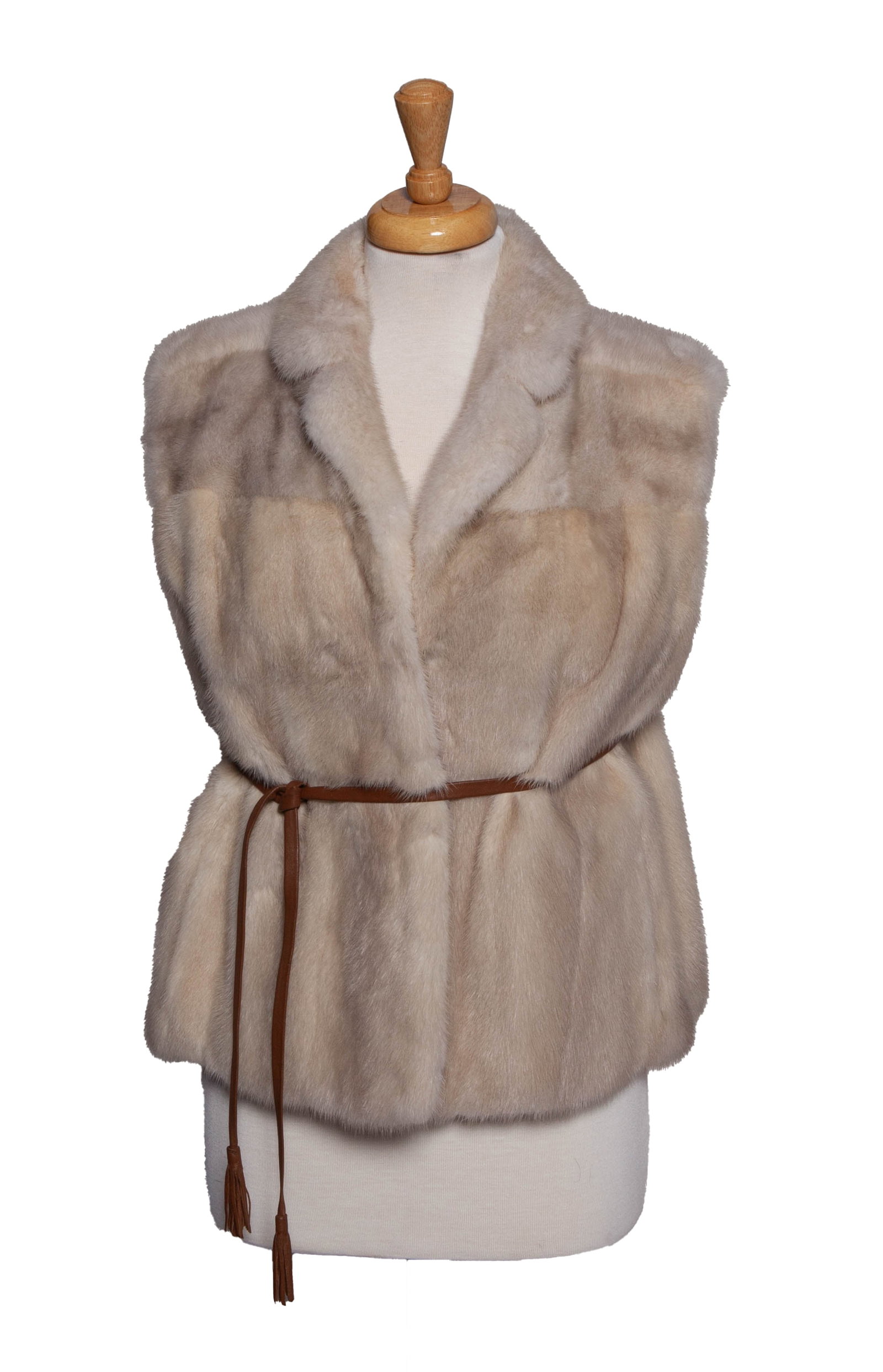 Vintage Black and White Fur Vest: An elegant vintage fur vest in black and white is monogrammed on the inside. In good pre-owned condition. Size s/m.
