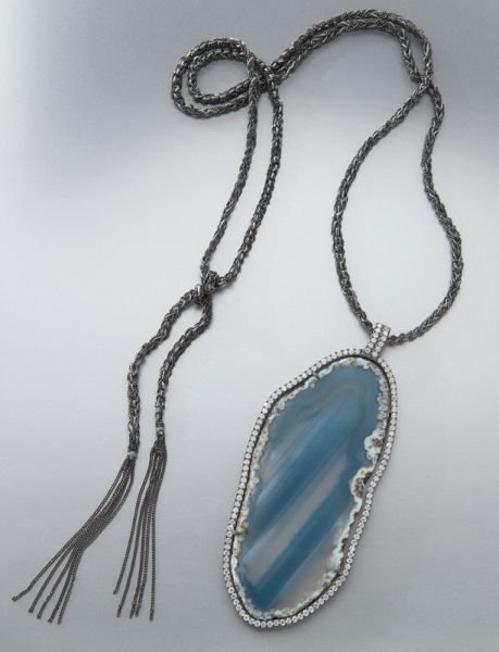 Agate pendant surrounded by diamonds on a tassel: Agate pendant surrounded by diamonds on a tassel chain. 54.6 grams with chain. 4"H x 1.5"W, Circa - Contemporary.