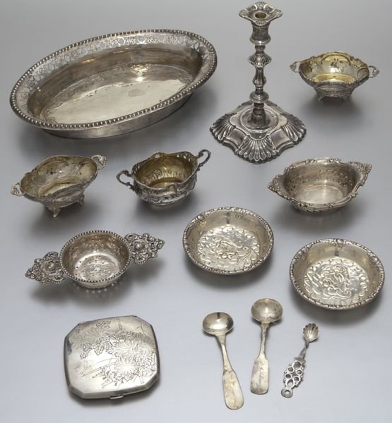 (14) English silver table articles: (14) English silver table articles with various maker's marks, including: (3) small condiment dishes with (3) spoons, one sterling; (2) pairs of nut dishes; (1) Georgian candlestick; (1) tray; (1) mir