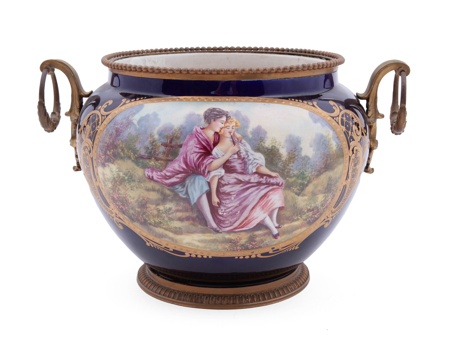 Sevres Style Museum Cobalt Blue Porcelain and Gilt Bronze Jardiniere: Sevres style jardiniere in blue cobalt finely decorated with a hand-painted medallion and gilt arabesques. The rim and base are decorated with gilt bronze details. The jardiniere features two de
