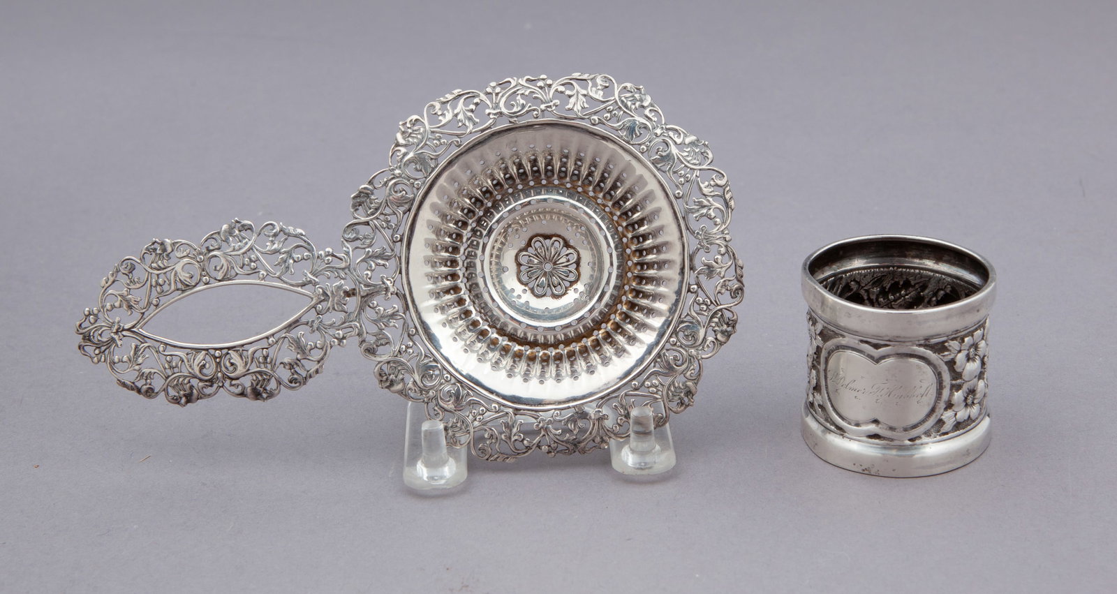 Sterling Silver Napkin Ring and Tea Strainer: Sterling silver napkin ring and tea strainer. Ring monogrammed. Total weight 78 g