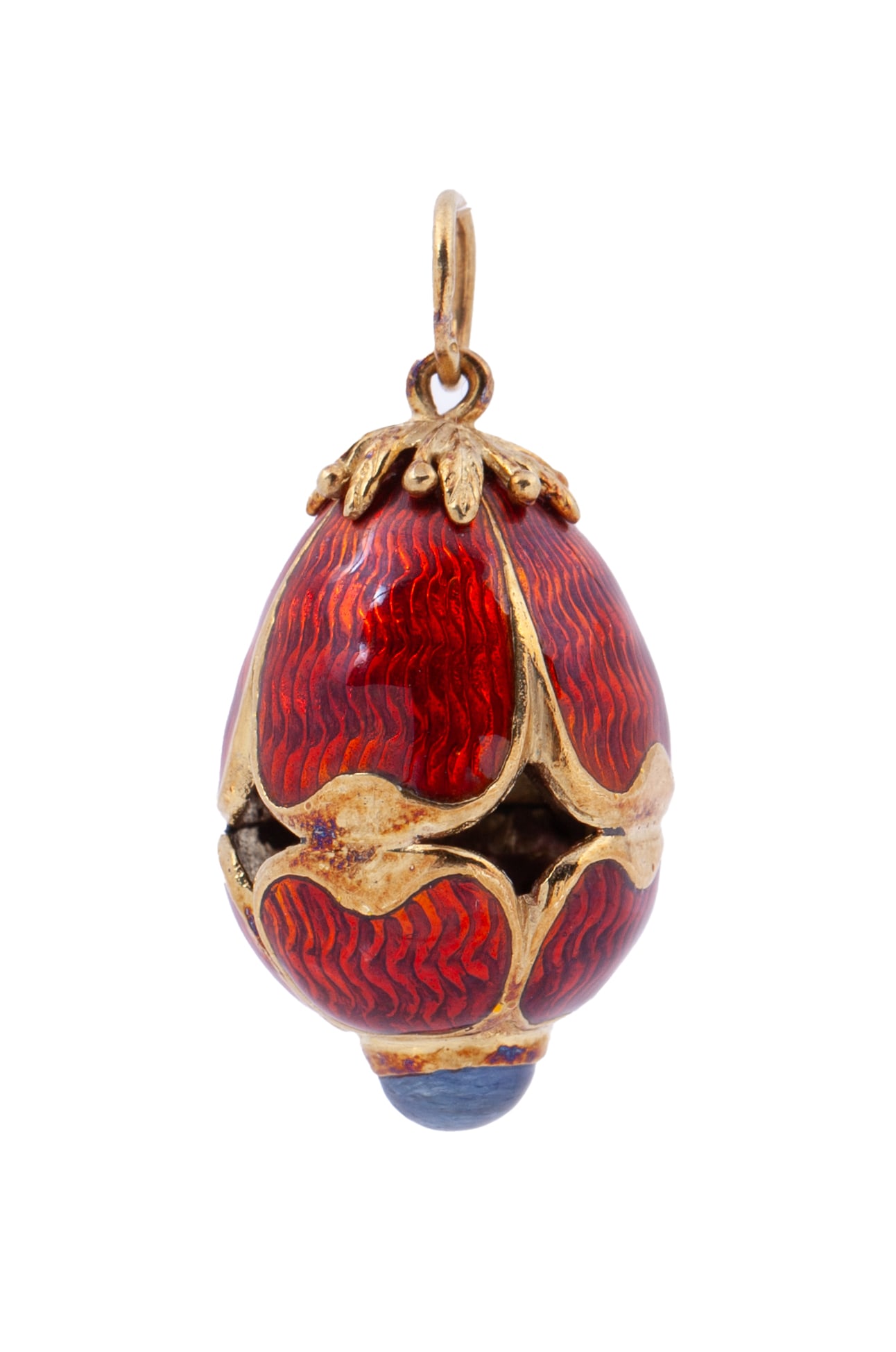 18kt YG and Enamel Egg Pendant: A beautiful red enameled egg pendant with cabochon sapphire on top set in 18kt yellow gold. 11g