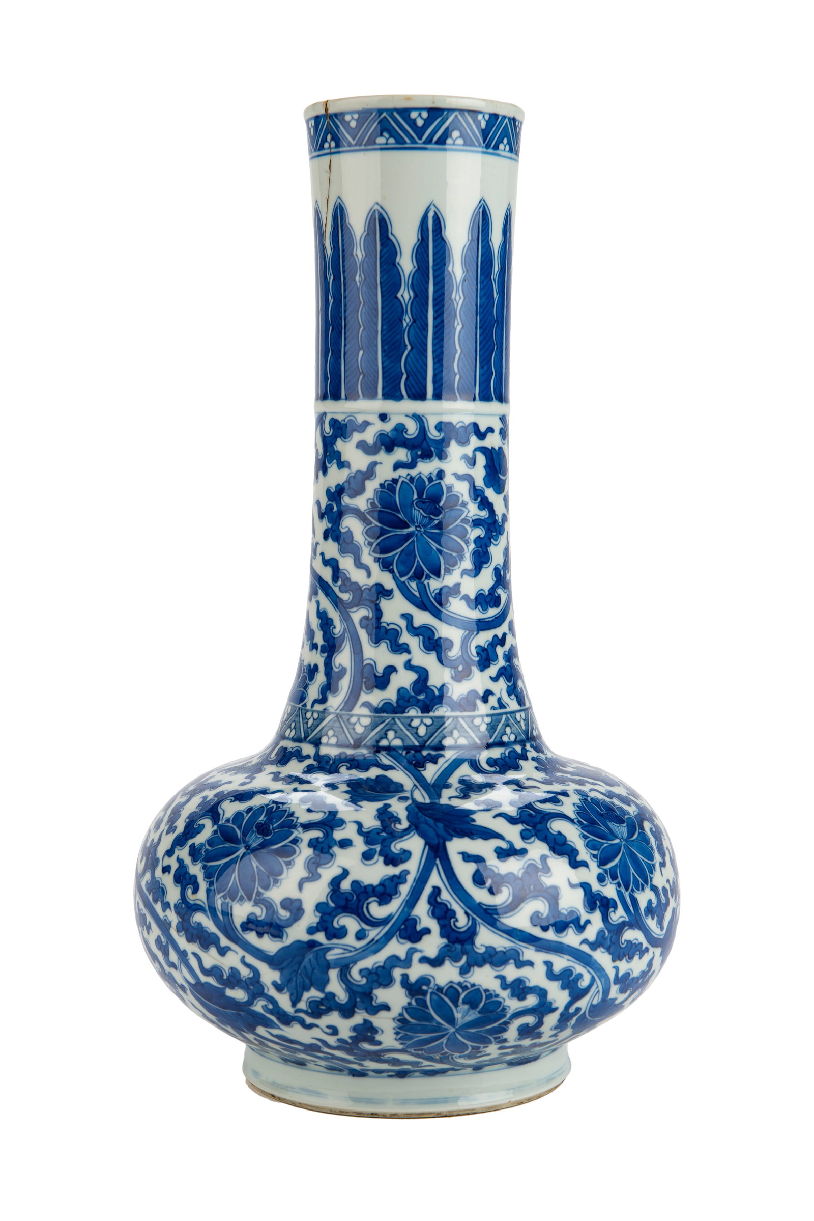 Chinese Qing Kangxi Blue and White Long Neck Vase: Blue and white vase depicting scrolling flowers with a double ring marked underside. Late 17th century, early 18th century. Measurements- H 17 x D 10 inches Condition- good overall condition; minor ch