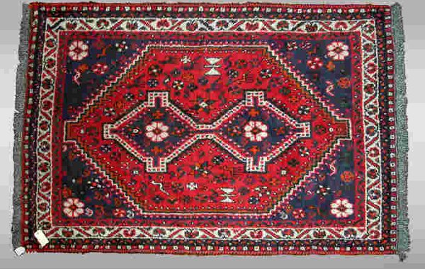A small Kazak Oriental Rug.