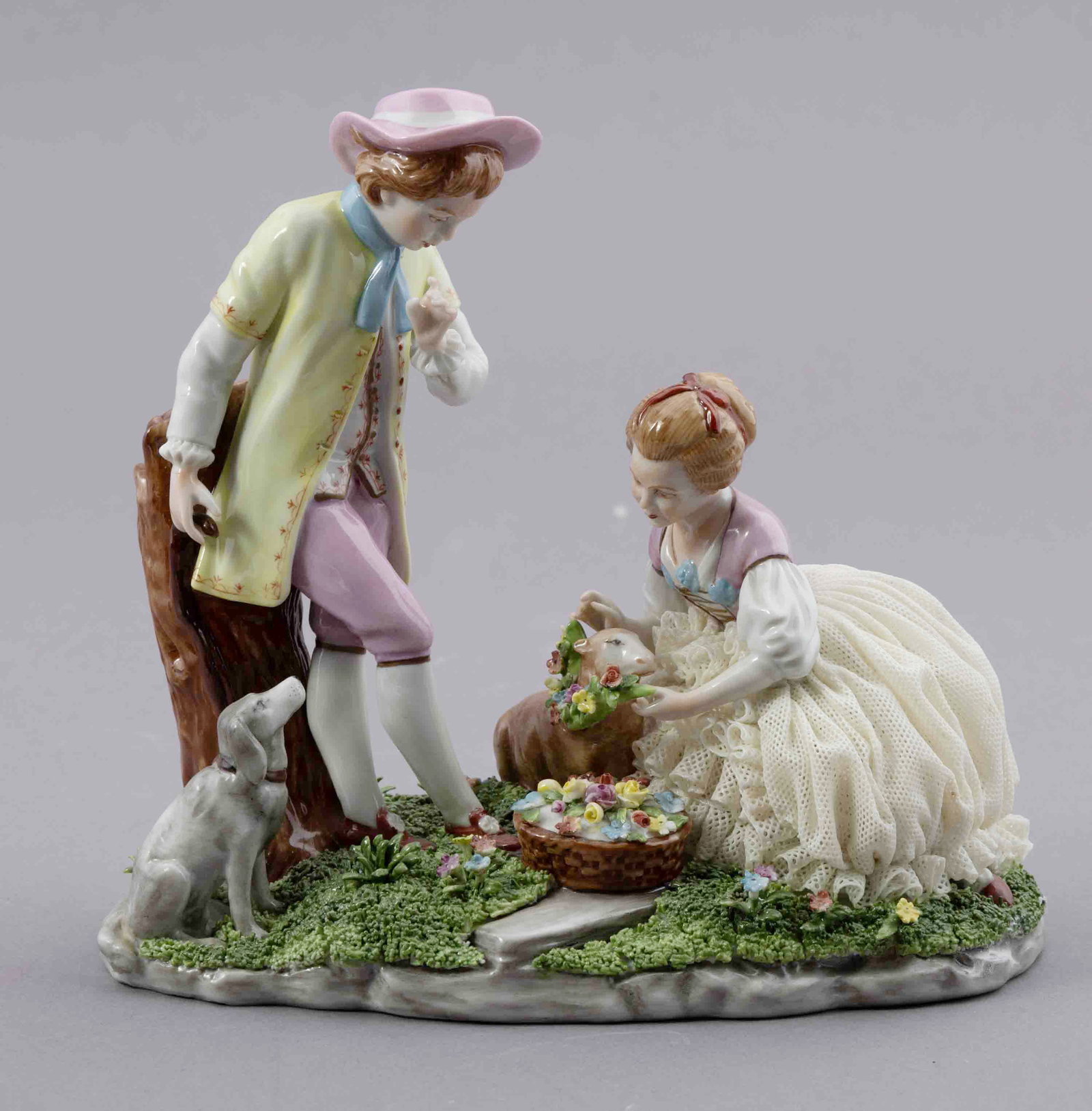Late 19th Century German Porcelain Figural - United Weiss Bach: A beautiful, and colorful, porcelain German scene of a male and female figure interacting with a lamb and dog. It is marked with Uniter Weiss Bach 1882 stamp on the underside. It measures H 7.25 W 7.5