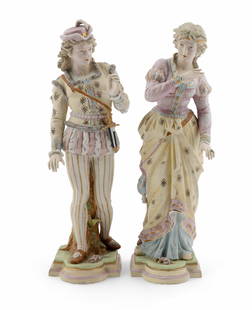 Early 20th Century Pair of Ceramic German Figures: Beautifully painted pair of German ceramic figures. They are unmarked. They measure H 19 W 5.5 D 7 inches. Condition: very good, no visible damage to the pieces