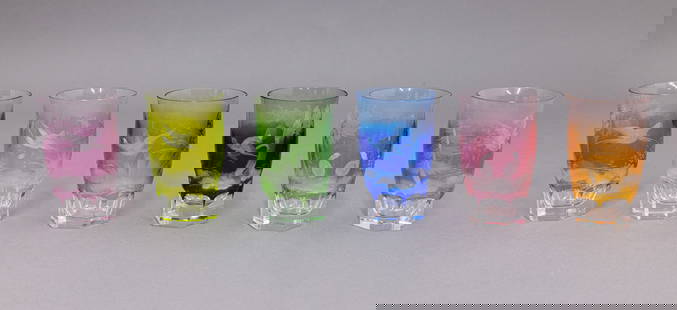 Set of Six Moser Crystal Vibrantly Colored Water Glasses: This is a boxed set of beautifully colored Moser crystal water glasses. This set is from the Birds of the Wild collection. Each features an etched landscape/bird motif. They are all marked on the unde