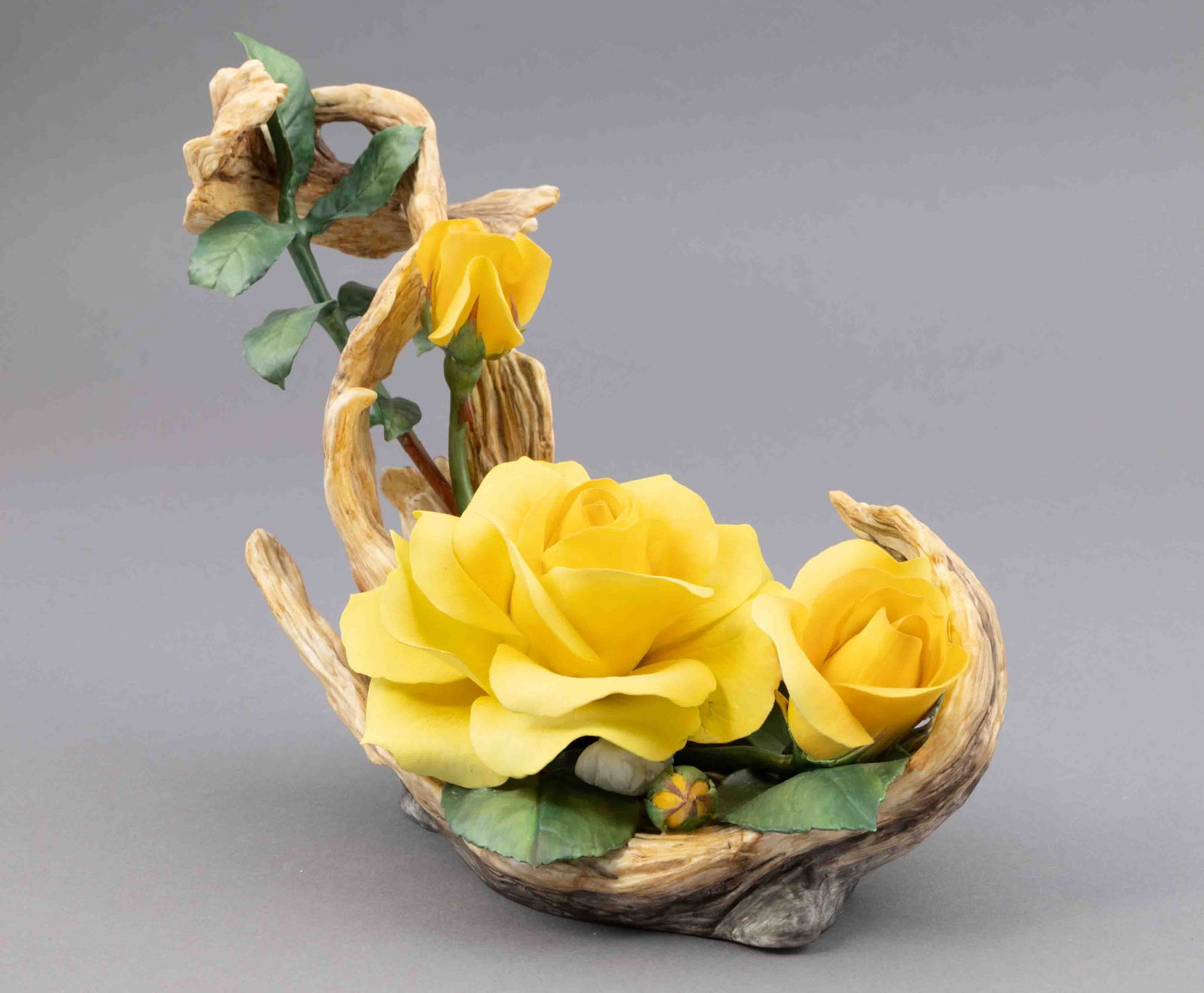 Boehm Bone Porcelain Flower, Grandpa Dickson Rose: Boehm bone porcelain floral figurine of yellow roses. Marked on underside. Measuring H 8 W 11 inches approx. Condition: good.