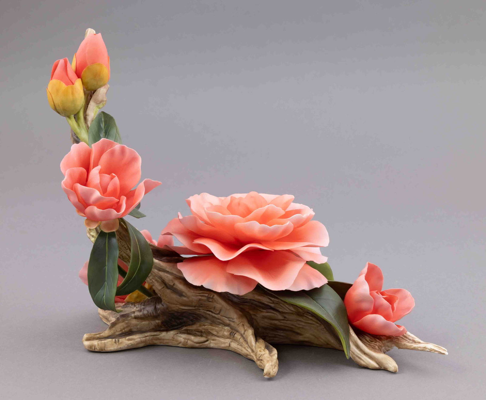 Boehm Bone Porcelain, Chrysanthemum Patel Camelias: Boehm bone porcelain floral figurine of pink chrysanthemums. Marked on underside. Measuring H 8 W 10 inches approx. Condition: good.