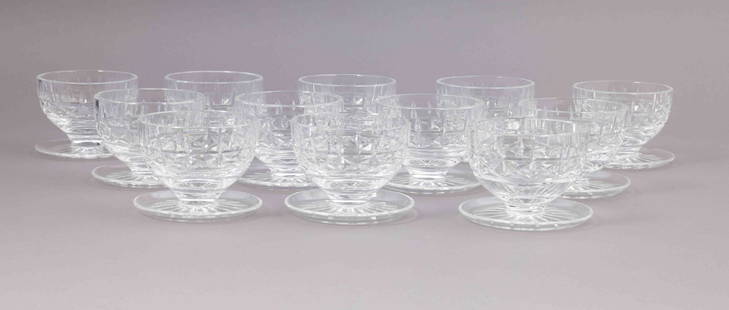 Set of Twelve Waterford Crystal Maureen Footed Dessert Glasses: A set of twelve Waterford crystal Maureen footed dessert glasses. They are all marked on the underside with the Waterford maker's mark. They measure H 3.25 W 4 D 4 inches. Condition: very good&n