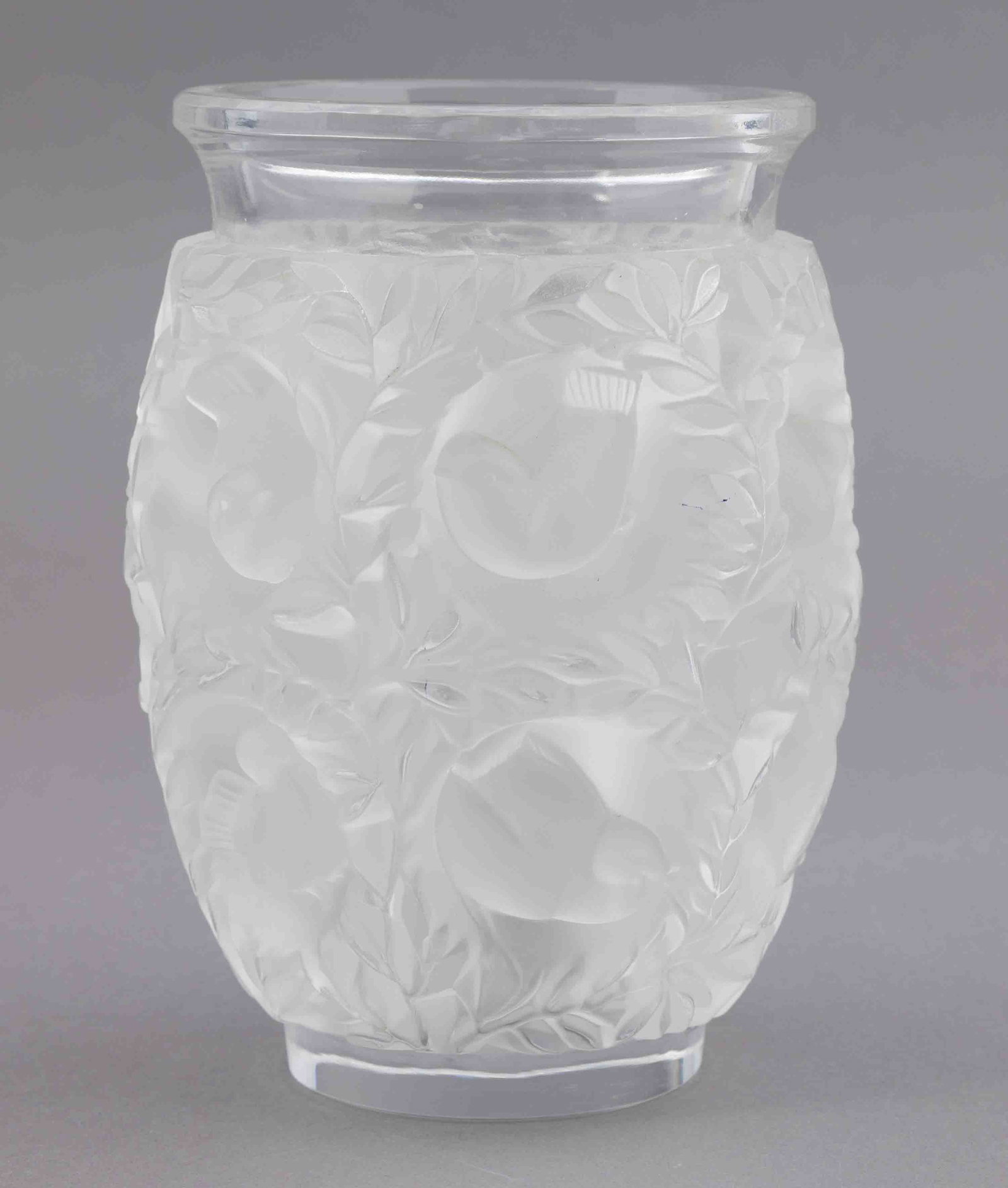 Lalique Bagatelle Glass Vase: A beautifully decorated Lalique Bagatelle vase. It is marked on the underside with the Lalique maker's mark. It measures H 7 W 4.5 D 4.5 inches. Condition: very good 
