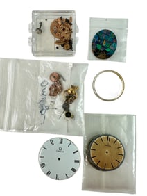 Collection of Vintage Omega Parts and Dials