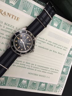 Mens Vintage Rolex Submariner Circa 1966 Ref 5513: A lovely vintage Rolex Mens Submariner - Ref 5513. Circa 1966. Stainless steel, black dial, black bezel inlay with original pearl. One owner, all original on nylon NATO military strap. Including origi