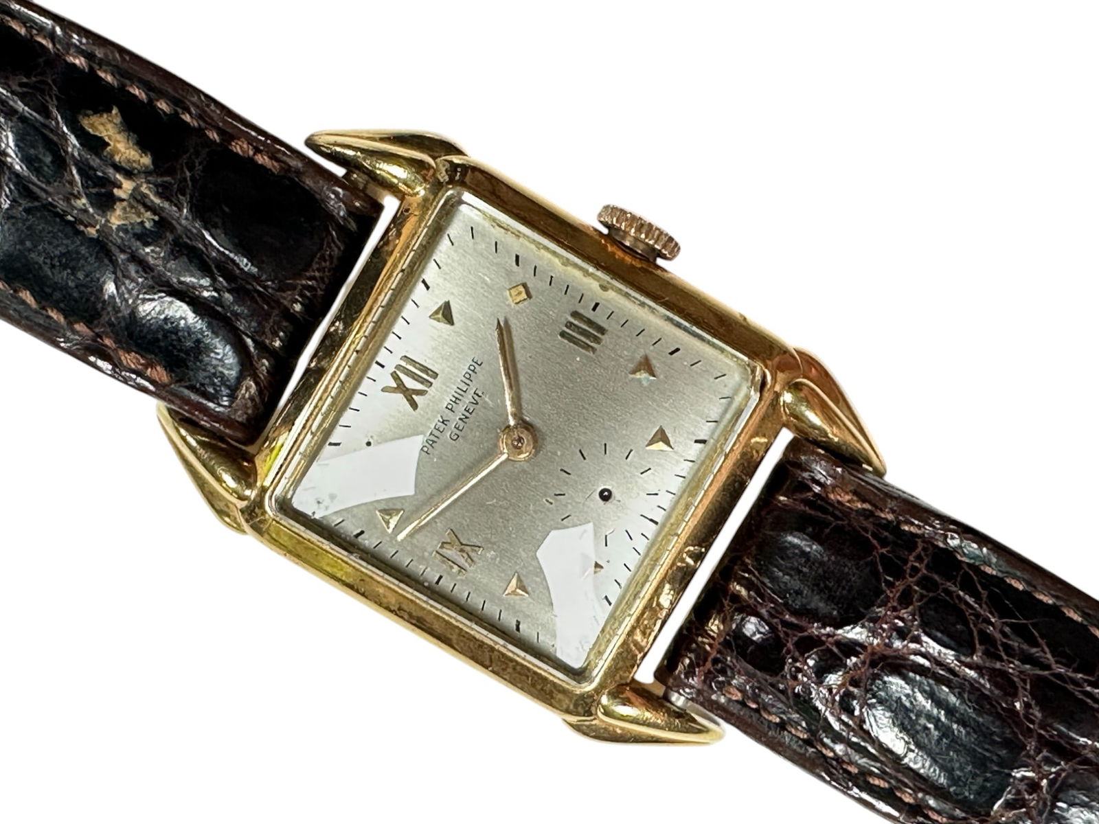 Mens 18kt Patek Philippe Ref 2411: Mens Patek Philippe in 18kt yellow gold. Circa 1940s. Ref 2411. Serial no 511001 Not running. Silver dial, gold roman numerals. 