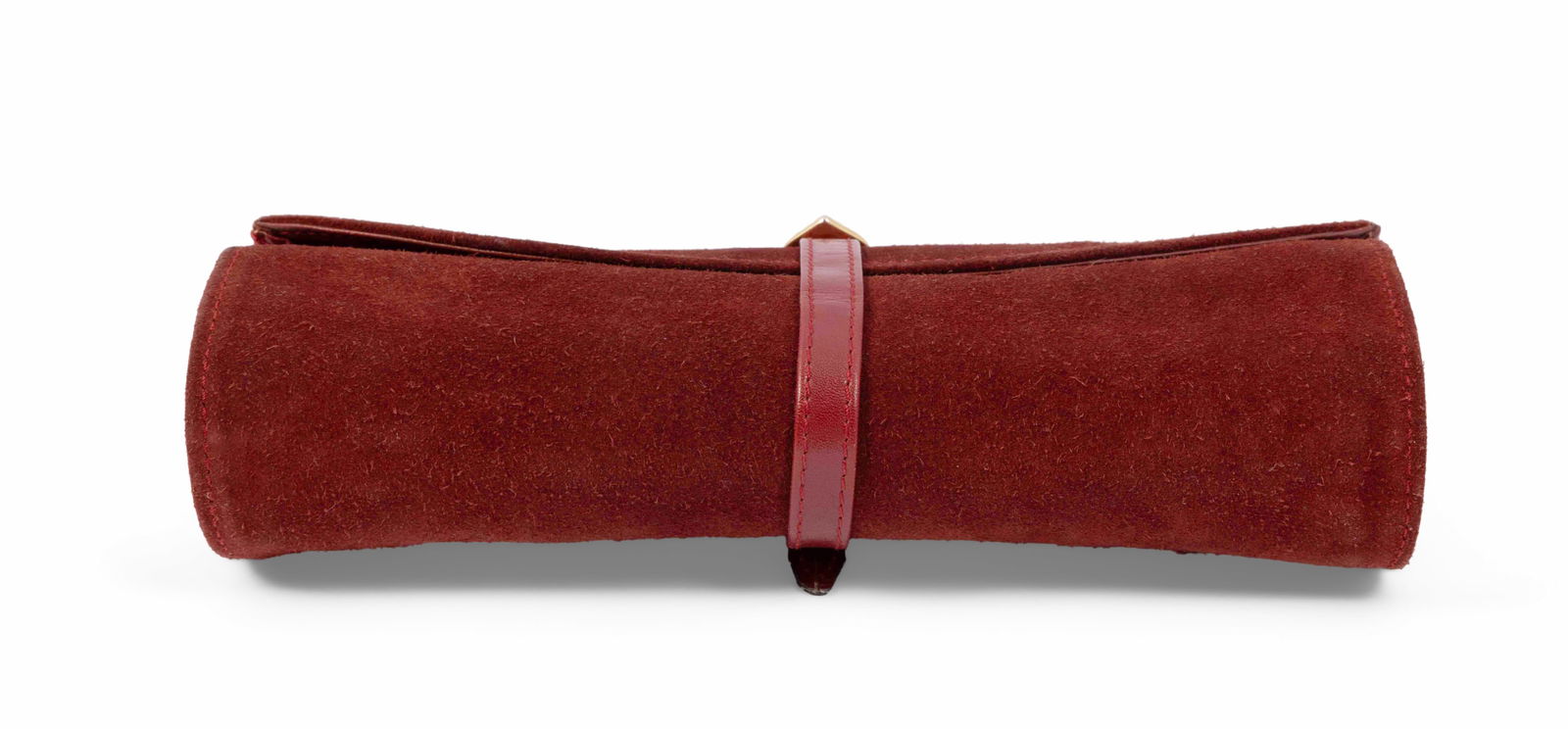 Vintage Cartier Burgandy Suede Jewelry Wrap: A vintage jewelry roll travel case by Cartier in burgundy suede with burgundy leather strap and gold tone buckle, opening to compartments. Measuring H 2 W 8 D 3 inches rolled. Condition: extensi