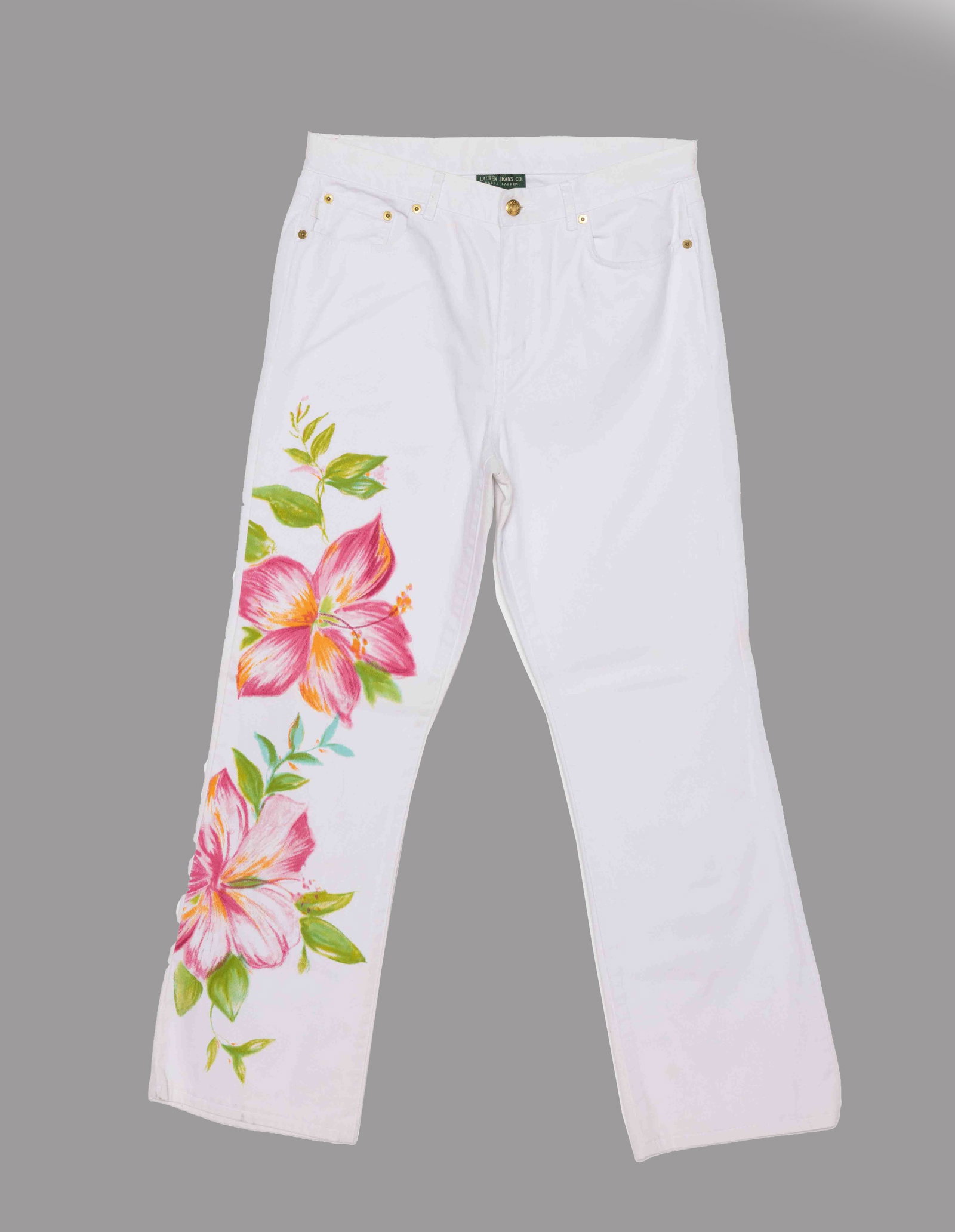 Ralph Lauren White Floral Jeans: A pair of Lauren Jeans in white, with pink flower details. Size 10 Condition: pre-owned, in very good condition.
