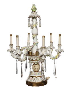 19th Century Dresden Porcelain 6 Light Candelabra - Electrified: This is a beautiful 19th-century Dresden Porcelain 6-light electrified candelabra. It is decorated with gilt designs throughout and has added flowers in blue, purple, and green. There are cut faceted