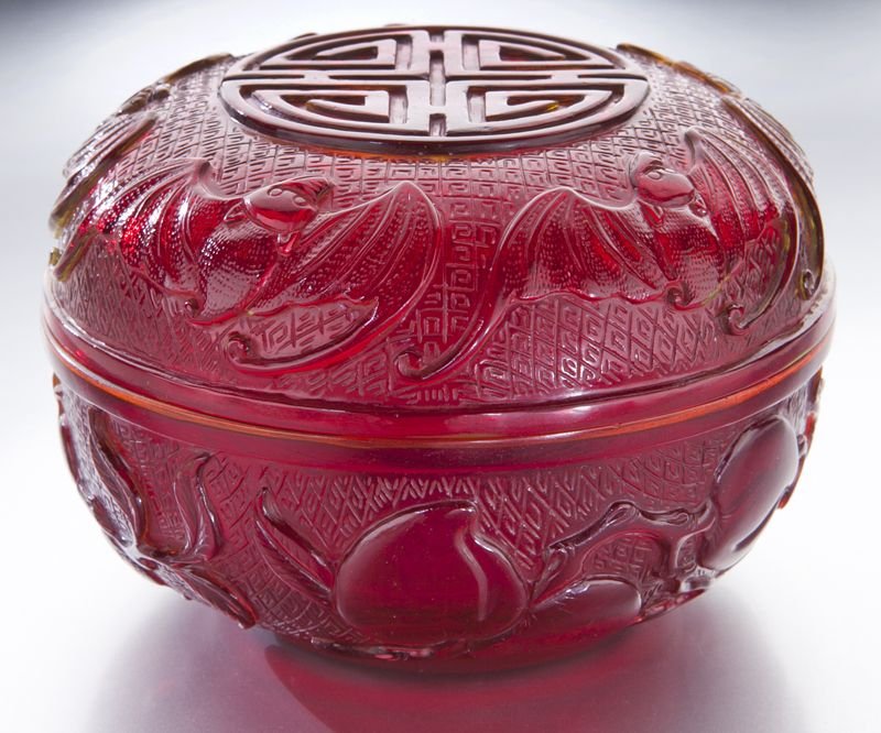 Chinese Qing Peking glass round box: Chinese Qing Peking glass round box carved to depict five bats and longevity characters. 2.75 "H x 4.125" Dia., Circa - 19th C.