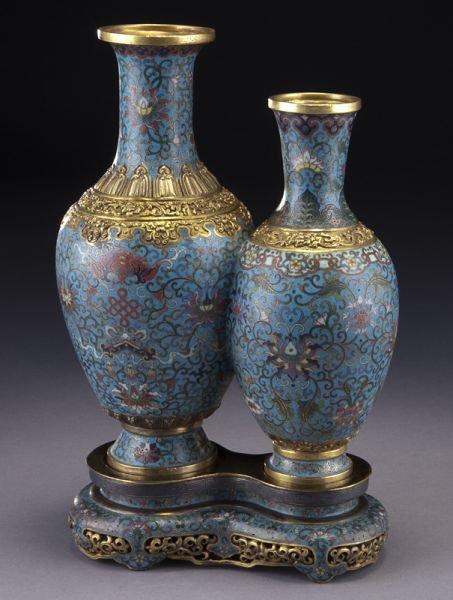 Rare Chinese Qing style cloisonne double vase: Rare Chinese Qing style cloisonne double vase depicting bats and chrysanthemum, raised on a cloisonne base. 12"H x 8"W, Circa - 20th C.