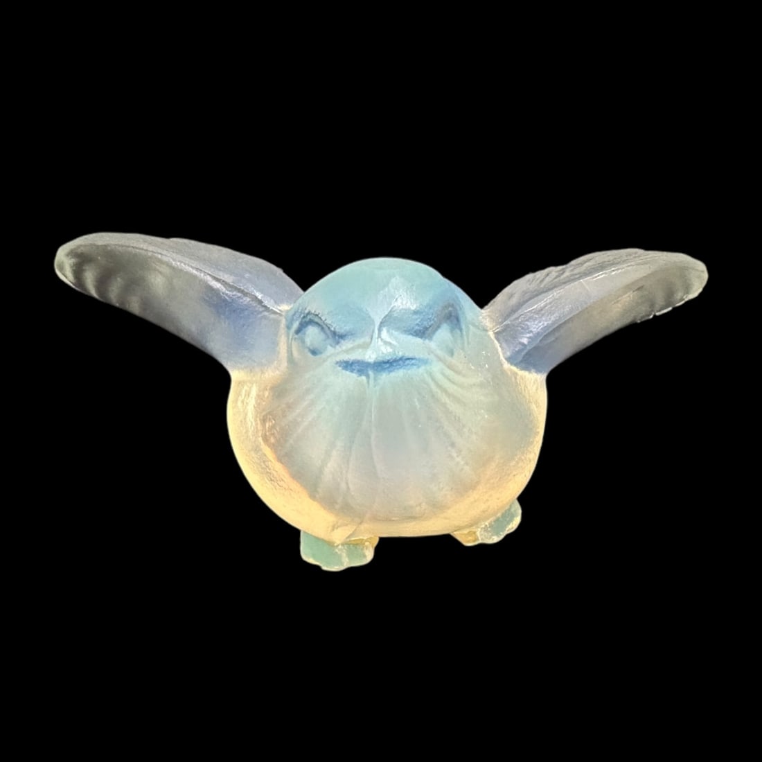Sabino Opalescent Glass Sparrow: A cute bird by Sabino. Signed in script, Sabino. Remnants of the original paper label. Measuring H 1 x W 2.5 x D 2.5 inches. Excellent condition.