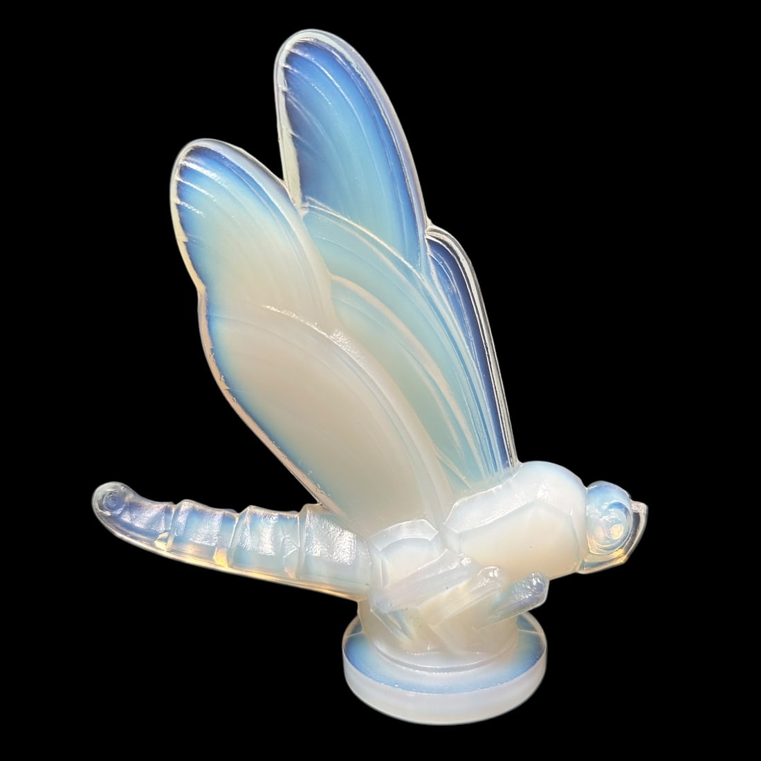 Sabino Art Glass Dragonfly: A dragonfly by Sabino in opalescent glass. Measuring H 6 x W 4 x D 4 inches. Signed Sabino France in script on the base along with the original red and gold foil label. Mint condition.