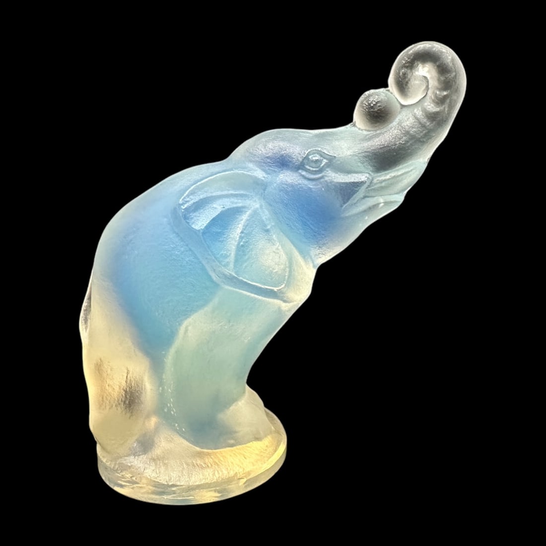 Sabino Art Glass Miniature Elephant: In opalescent glass - Elephant measuring H 2 x W 2 x D 2 inches. Signed Sabino France in script. Mint condition.