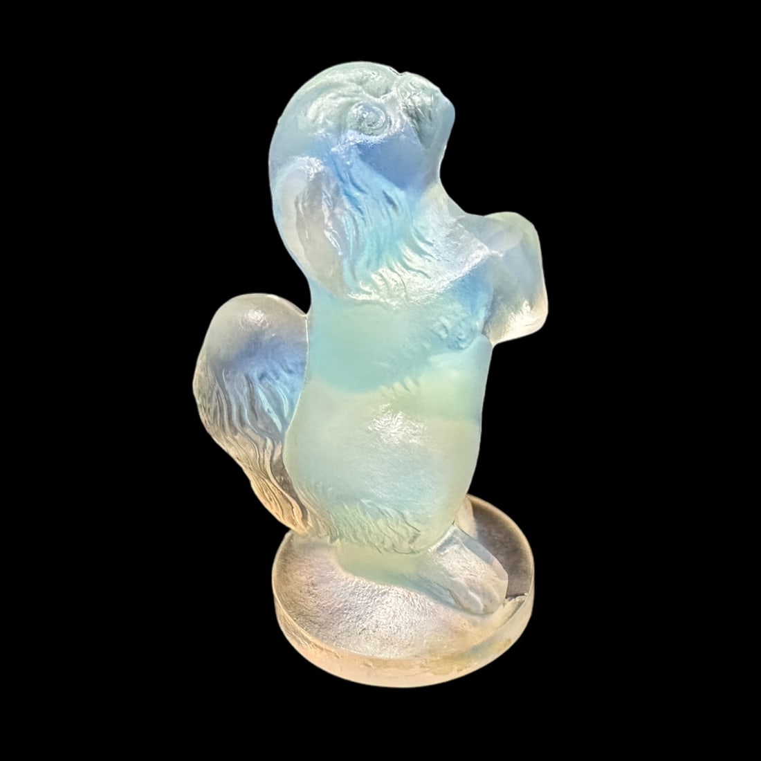 Sabino Art Glass Pug Dog: A cute pug down by Sabino in opalescent glass. Measuring H 2 x W 2 x D 2 inches. Signed Sabino France in script. Mint condition.