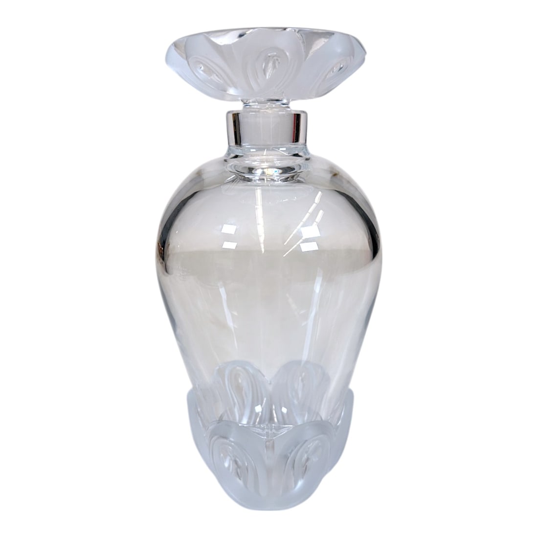 Lalique Fleurs Whiskey Decanter: A beautiful whiskey decanter by Lalique in the Fleurs pattern. Measuring: H 8 x W 4 x D 4 inches Excellent condition.