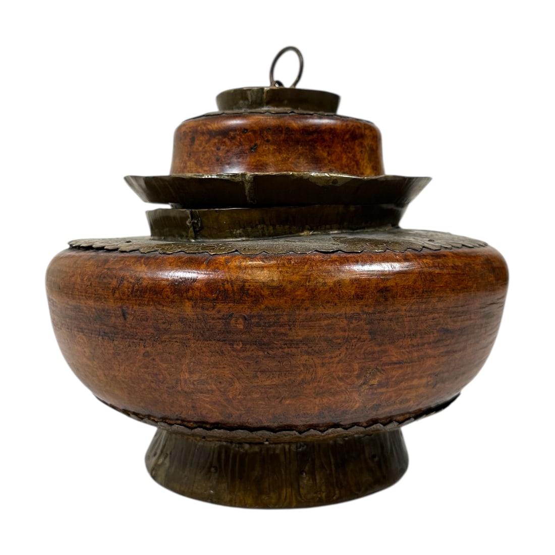 Early 20th Century Burlwood and Brass Tibetan Tsampa Bowl: A 20th-century Tibetan tsampa bowl with lid in burlwood decorated with brass fixtures featuring floral carvings on the bowl and lid. Measuring: H 9 x W 9.5 x D 9.5 inches Condition: Wear consistent wi