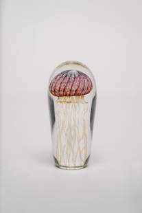 Richard Satava Jellyfish Art Glass Paperweight Circa 2008: Rick Satava American, b.1954 Jellyfish Art Glass Sculpture Circa 2008 Domed form in clear glass internally decorated with a striated pink jellyfish. Signed Satava 802-08 Measurement: H 6 x W 3 x D 3 i