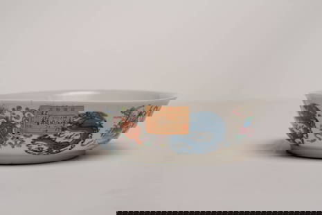 Antique Chinese Bowl with Decorated Dragon Motif: This antique Chinese bowl is decorated with five blue and white dragons on the outside, with multicolored traditional Chinese symbols. The underside features some markings that may indicate the maker